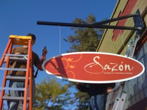 sazon_sign Matt our newest employee putting the finishing touches to the sign!